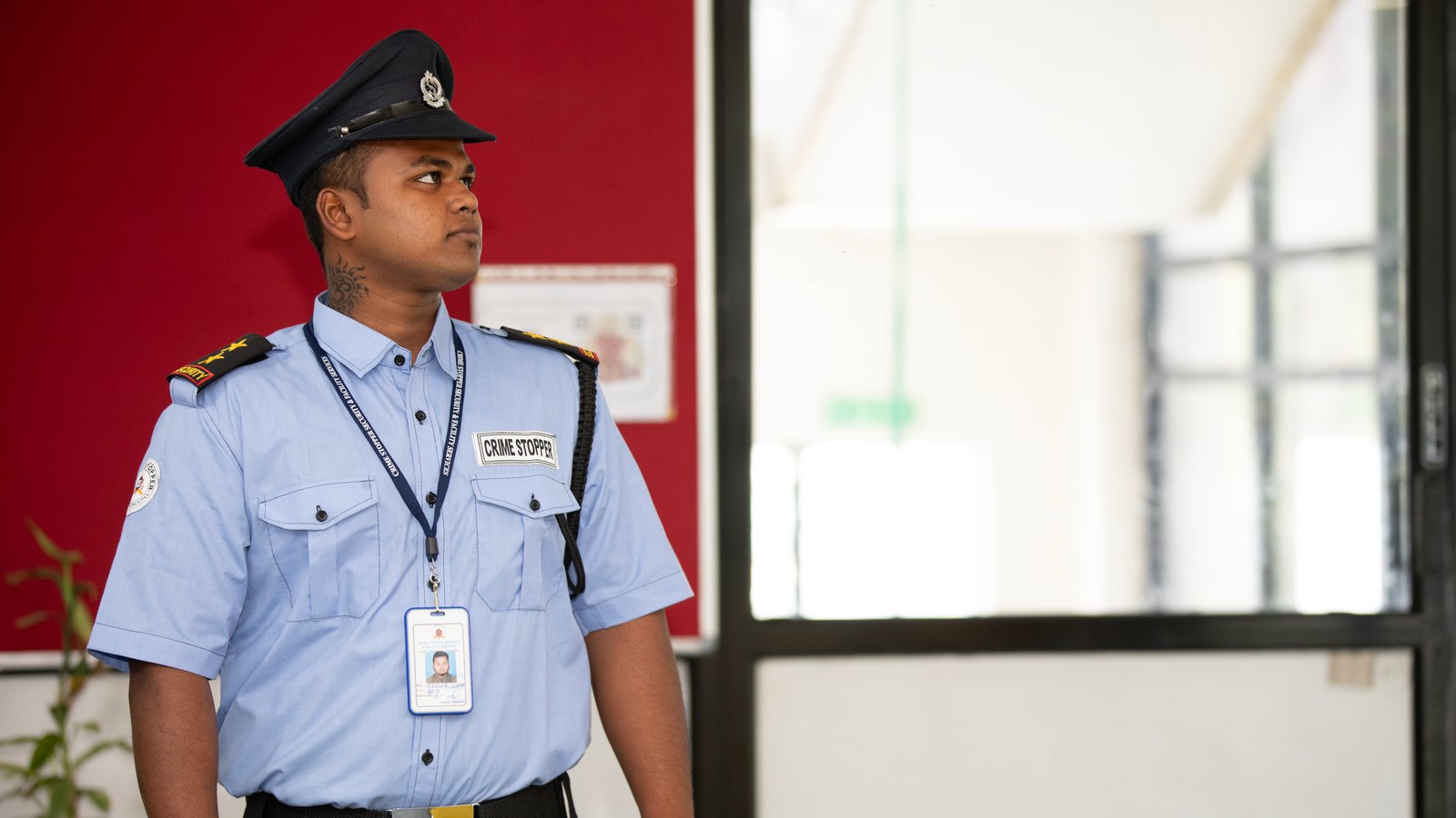 Uniformed security guard on duty at a client site